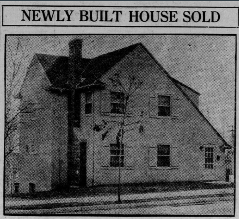 Black and white newspaper clipping with the headline "NEWLY BUILT HOUSE SOLD," showing a two-story house with a steep roof, chimney, and a small tree in the front yard.