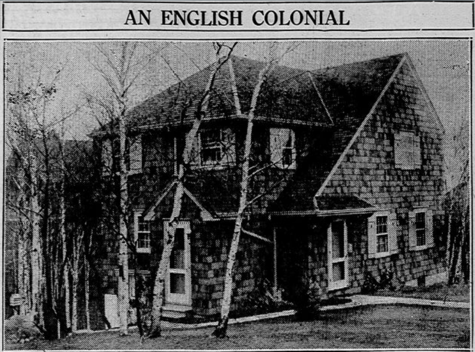 Black-and-white photo of a two-story house labeled "An English Colonial," featuring shingle siding, multiple windows, a peaked roof, a covered front entry, and several leafless trees in front.
